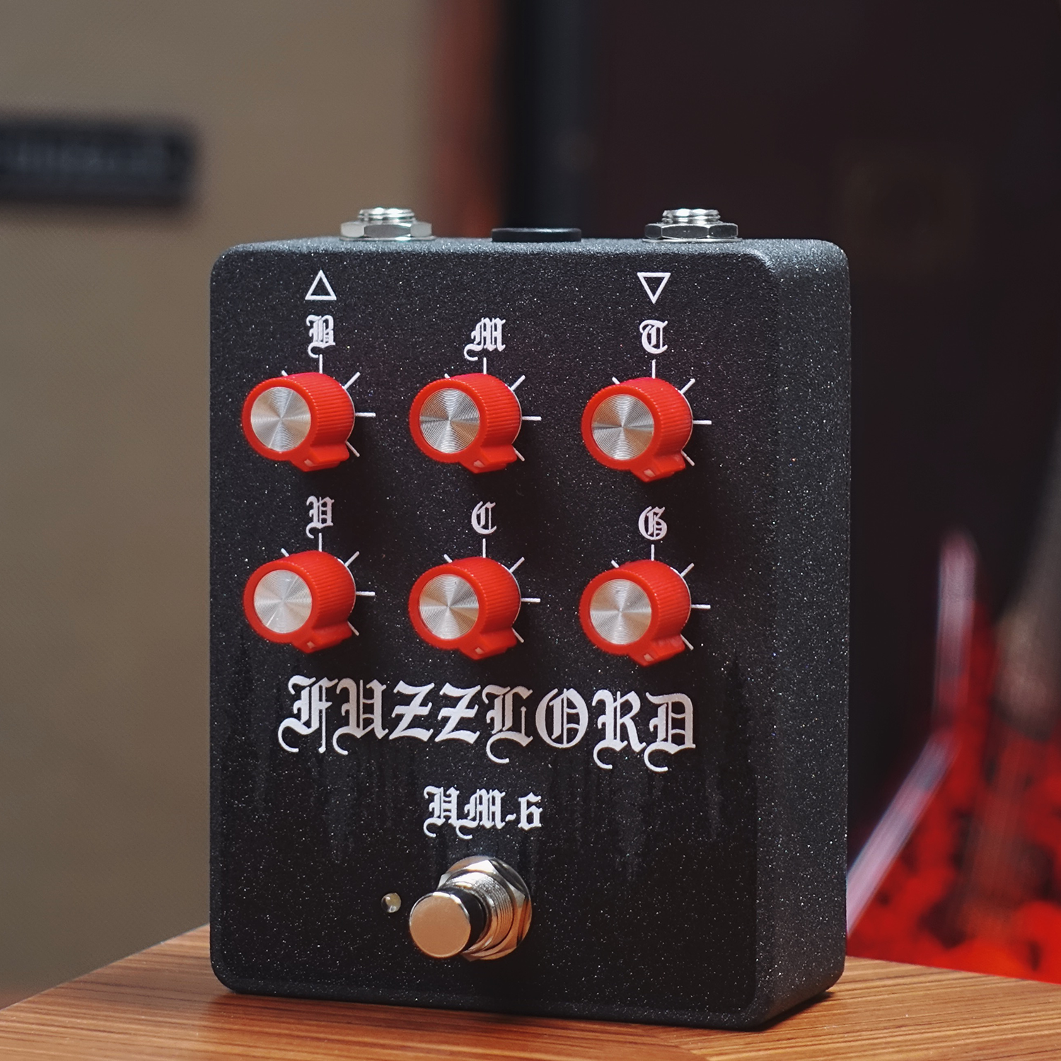 Black and red Fuzzlord distortion pedal based on HM-2 at Cult FX headquarters
