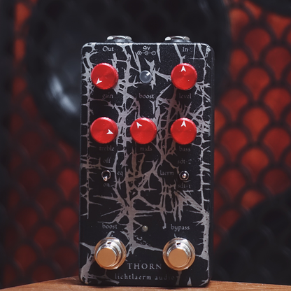 Lichtlaerm Audio Thorn pedal with Black & Red design on a transparent background