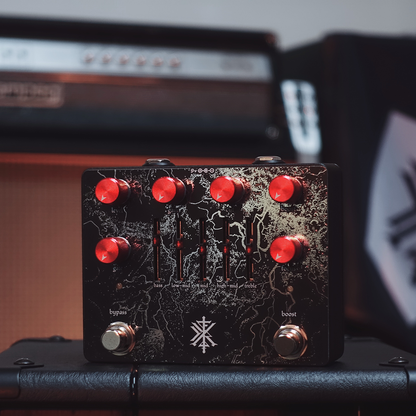 Total Distortion Worship MKII pedal with red knobs on a detailed black background