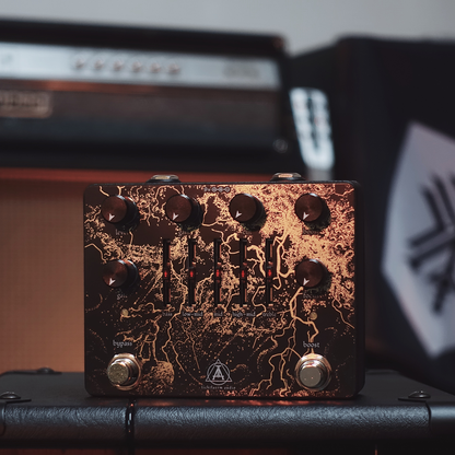 Total Distortion Worship MKII pedal with red knobs on a detailed black background