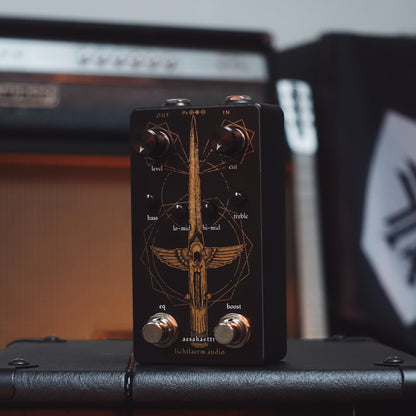 Black and gold Lichtlaerm Aesahaettr Boost pedal for guitars at Cult FX headquarters
